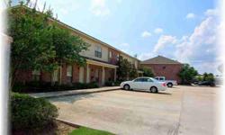 Ready for a new owner, convenient to LSU in a gated community, with only 36 condos. Unit is on the top floor. Interior has a beautiful HARDWOOD staircase, CUSTOM cabinets and CERAMIC TILE counter tops and floors. Both bedrooms have PRIVATE entrance to a