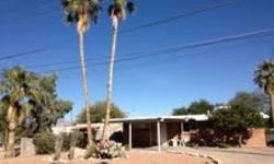 Great 3 bedroom/2 bath home perfect for a starting family or a motivated investor. Conveniently located in Central Tucson, close to great schools, binking distance to U of A, UMC and more. Newly replaced 16.5 seer AC and Furnace in 06/11. Roof had a