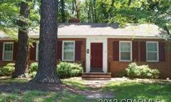 Walk to class at ECU! Perfect for students or professional, this 3 bedroom, 1 bath all brick home has great curb appeal! Large living room with fireplace, formal dining & bedrooms with refinished hardwoods. Charming den has a fireplace too! Kitchen with