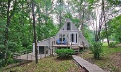 Completely updated Sweetwater charmer! 35 mi S of Indy beautiful wooded lot. Fantastic full time or part time home in beautiful Brown Co. Access to both Sweetwater Lake & Cordry Lake. Enjoy skiing,boating,& relaxing on the beach.Private setting! Surround