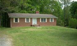 Brick ranch with partially finished basement on 1.22 acres in eastern Cabarrus. Basement has kitchen, separate entrance and is plumbed for full bathroom. Could be finished for second living quarters. Private back yard and deck backs up to woods. Sold as
