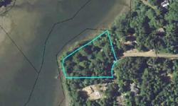Two Acre, Tree studded 'South Slough' Bay Front Homesite. City Water ,Sewer, underground power and phone are on the Lot.This property will need to have the homesite cleared before you build.Listing originally posted at http