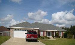 Located in Foley - only 15 minutes to the beach, this brick home was built in 2006 and has an open great room, fireplace, split bedroom plan, large screened deck, cul de sac lot which means large back yard. Privacy fenced. 3 bedrooms and 2 baths + nice