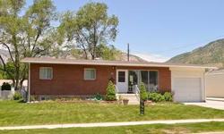 Updated Rambler in a great neighborhood in Ogden. Updated kitchen with custom maple cabinets, solid surface counter tops, and 5 burner gas stove. New paint and carpet. Fully fenced backyard with a fun swing set and a garden. Room to grow in the basement.