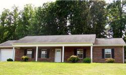 Immaculate, well-maintained brick ranch within Morganton city limits. Built in 2000. Welcoming front porch. Large, open great room with custom built-ins in the living area, dining area with French doors leading to patio, and bright kitchen. Three spacious
