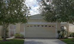 Pristine new listing on beautiful golf course home site! Stunning 2 bedroom 2 bath maintenance free villa in The Groves. This great room plan offers a large kitchen with coffered ceilings, white raised panel cabinetry, white appliance package which