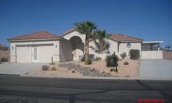 Palm Gardens community just a few miles NE of Laughlin- Beautiful 2 bed, 1.75 bath home with southwestern charm. Built in 2002 w/1,665 sq ft of living spcace. Tiled flooring throughout, bright and airy, white kitchen appliances and cabinetry, opens to