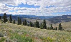 Top of the World Views! This 30 acre property has it all! 360 degree views! Installed 3 bedroom septic system, 400 amp service, adequate well installed with frost free spigots, artistic concrete pad with fire pit in center, driveway and parking graveled,