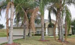 Huge palm trees in the front yard of this spacious well-cared for 4/2 home greet you on over sized corner lot. The large foyer opens to the dining room to one side and the living room on the other side. The kitchen has a corner pantry, center island with