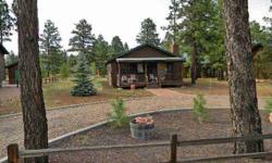 Make yourself at home in this log sided 2BR/2BA cabin in popular Bison Ranch. Open & bright floor plan w/stone surround gas FP, entertainment center & laminate flooring. Metal roof, covered front porch, open rear deck off MBR, paved walkway, circular