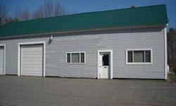 Fantastic location for your home & business. Commercial building w/2 over sized garage bays plus separate storefront. Attached 3 to 4 bedroom home or rental unit. Offered as-is".
Listing originally posted at http