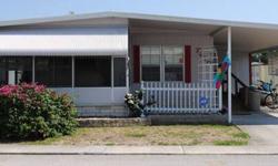 It is a 1977 double wide home with a net price of 12,500 as is or 14,500 with new floors. It has 2 bedrooms and 2 bathrooms with walk-in closets in every room. It is very spacious, including a front patio with wooden floors. Includes a brand new roof, new