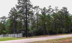 Beautiful 2 acre lot in prestigous Lake Windcrest, a golf course community. Across from park/tot lot. Horses allowed. Close to The Woodlands.Listing originally posted at http