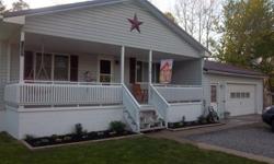 2 bedroom 1 bath country house for sale in Hollidaysburg, PA. There are many updates, including a new metal roof!