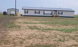 VERY NICE 4 Bedroom, 3 Bath Doublewide Solitaire Mobilehome on 7.38 acres (2006 Model), masonite siding, metal roof, 2 Central A&H units, built-ins, fireplace, thermal windows & doors, septic system, 1.5 hp submergible well (constant pressure). 2624' lv.