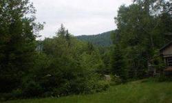 Fabulous country setting for your new home! Existing power, water, sewer on-site; mobile home may remain or will be removed by seller. 58.6+- acres is mostly wooded and in the VT Land Use Program. Cabin located near the back of the property. 5 minutes to