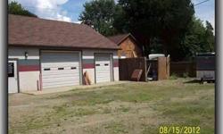 Workshop/garage located in busy North Warren connector. Cement block building currently used a s workshop. Drive through capability. Large parking area. Newer part of garage has radiant heat and pull down storage. 16'x21' storage shed to remain.Listing
