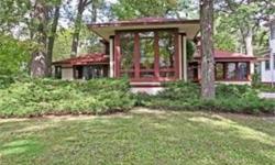 Distinctive Frank Lloyd Wright Prairie School Style home designed by John Van Bergen. Stunning 2-story LR w/woodburning fireplace, surrounded on 3 sides by lovely balcony, adjoining sun-filled family rm opening to deck. Spacious dining rm w/2 walls of