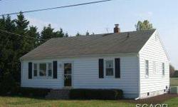 New roof, siding and windows on this charming home that backs up to quiet fields. On a double lot with a huge (35x40) detached garage/workshop. Fenced-in back yard, additional off-street parking and three roomy bedrooms. Great location in county seat and