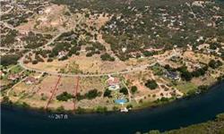Lake Austin waterfront lot located in the prestigious Caslano gated community. Lake and Hill Country views. Lot is directly across the lake from Balcones Preserve. Approximately 267 feet of water frontage on 2.90 acres with boat dock frame already