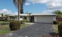 Great Opportunity! Nice Pool Home in the Villas Neighbohood in Fort Myers. Tax records show this home as a 3 Bedroom though its a True Two Bedroom Plus Other with Two and a Half Baths. Tiled Entry. Great Tiled Kitchen Huge with Pantry, Pass Through Window