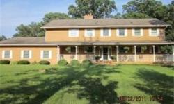Rare find! Beautiful 5 bdrm home nestled on 2.2 acres of lush, wooded landscape! 1st flr updated, 2nd flr added in 1995, updated in 2011 incl new carpet. Gourmet kitchen w/Cherry cabinets, granite c-tops, new flr, eat-in kitchen. FR/DR w/cozy fpl & lrg