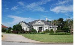 This lovely home is in Lake Jovita Golf and Country Club, a 36 hole golf course community near Dade City north of Tampa. This 3,040 sq.ft. home sits on a .88 acre lot with enhanced landscaping and overlooks a beautiful wooded area. The 4 bedroom 3 bath