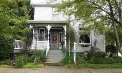 Charming 3 bedroom Victorian home. Beautiful entry, large eat in kitchen with breakfast area & island,copper pressed tin ceiling, maple cabinets, new hardwood flooring, charming dining room, gas fireplace, new composite deck/vinyl railing, New full bath