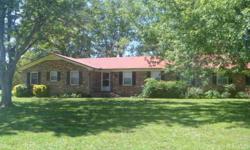 Right outside Cookeville City Limits you will find a one owner brick home on a beautiful large lot with mature trees. This home was custom built in 1977 and offers 1960 square feet of living space, 3 large bedrooms, 2 full baths, an oversized great room,