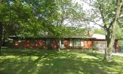 Make this solid brick ranch your home. This is a true 4 bedroom ranch featuring a spacious living room, formal dining room, eat-in kitchen overlooking the gorgeous L-shaped wooded, acre plus lot, a sunroom off the 3rd bedroom, 1.1 baths, an attached 2car