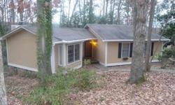 Great neighborhood, large wooded lot with small creek running through back, close access to I-20, I-77, Fort Jackson. Large great room with vaulted ceilings and brick wood burning fire place. Neutral colors.