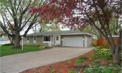Charming & updated walk out rambler on cul de sac lot. Gorgeous landscaping, new windows & siding, hardwood and tile floors, eat in kit w/ doors leading to deck with walk out lower level.