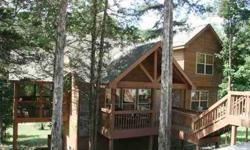 Furniture included. Roomy Main level with Towering 2-story stone fireplace, Pine Vaulted ceilings & great rustic wood detailing. Live the Luxury Cabin lifestyle. TWO incredible luxury suites both with jetted tub & separate shower. One suite Main level,