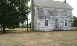 This old farmhouse has been in the same family since it was constructed over a hundred years ago. Although it is in need of complete renovation, the history within its walls is amazing! Being sold as lot value for those who would like to renovate the home