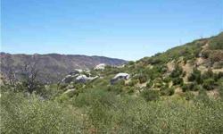 This is one of 4 approximate 37 plus acres sites with exceptional views of the valley and mountains. You will appreciate the privacy and serenity this parcel affords as well as viewing of wildlife. Great knolll for building site with no obstructions of