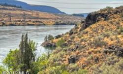 Call of the wild...top Walleye & Sturgeon fishing area, wildlife & indigenous natural habitat on 5.6 acres, FERC high water mark bordered land to the Columbia River. You'll enjoy the undisturbed landscaping, rock formations & changing seasons of beauty