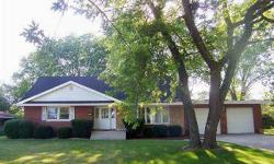 Make your appointment now for this large three bedroom, two bath one-and-a-half story in Merrillville?s Brookwood Subdivision that?s priced to sell and is an estate sale. There is a large living room with a brick fireplace that is open to the formal
