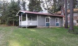 Quiet location for this modest lake cabin at Diamond Lake. Diamond Lake Beach Club membership gives access to a sandy beach and swim dock. Privately owned boat slip is included in the sales price. One and a half lots gives ample room for future additions