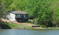 Amazing Deal on a LAKEFRONT HOME at Terre du Lac, which offers 16 lakes, including 4 ski lakes. This home was built in 1986 and sits on Lac Bergerac (a 7 acre fishing lake). Offers over 1,700 sq. ft. of living space with 3 bedrooms, 2 bathrooms, a living