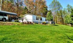 This is a charming 2 bedroom, 2 bath home located on 50 acres in Lee County, Virginia. Recently remodeled with new windows and an updated Master Bath. Decking on the front and side allow you to take in the beautiful views and surroundings of the well
