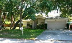 This 3 bedroom, 2 bath, 2 car garage home is located in Lake Shore Estates, a waterfront community in Palm Harbor, Florida. The home offers wall-to-wall carpeting with tile in the kitchen and bathrooms. The kitchen features white cabinets along with all