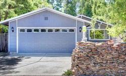 Wonderful single level home that has 3 bedrooms, remodeled master bath, and remodeled other bathroom, open kitchen to connecting dining area, large living room with wood burning stove. Central heat and Air Conditioning. Relax on either your front or