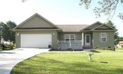 Newer 3 bed/2 bath on 1 acre. Home has split bedroom plan, with plenty of closet space. Lg living room with cathedral ceilings. Kitchen has lots of counter space & cabinets have dark cherry finish, with crown molding. All kitchen appliances remain with