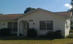 Waterfront home located approximately 15 minutes out to Charlotte Harbor, featuring 2 bedrooms, 2 bathrooms, 1 car garage, and block construction. Other highlights of this home include a screened lanai, sliding glass doors, dock, tropical landscaping, and