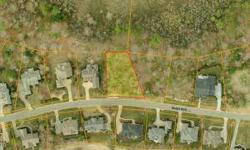 Beautiful private, wooded lot in governor's land. This has a gentle slope and would accommodate a walkout basement. Listing originally posted at http