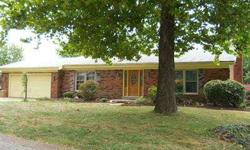 Spacious brick home in good location and good condition. Enter open foyer with ceiling and coat closet. To the right is the cheerful living room with a picture window, high beamed ceiling and new carpeting. Very large updated eat-in kitchen with new