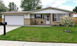 TASTEFULLY UPDATED-GREAT LOCATION!
Three good sized bedrooms, master is 15X11.
Two full baths, hall bath features tiled flooring, newer tub surround, Corian countertops and linen closet.
Spacious living room with two sided Oakley stone fireplace and