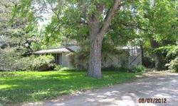 Wonderful property with an out buling used as an office with Propane Fireplace and workspace. Lots of Trees with some fruit trees. This is a very private location in Kimberly and very close to everything in Kimberly. Please come to see this home. cn