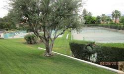 Mountain Villas is a lovely tree lined gated community in So Palm Desert just east of Deep Canyon. This home is an end unit which looks out over a large greenbelt with no homes in front on it.The main level has a large living room with fireplace and a