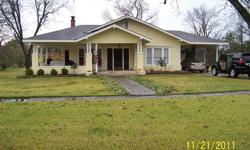 This is a wonderful house in the country 5 miles from Cleveland. It has three bedrooms, 2 full baths, living room, dining room, breakfast room, kitchen, large central hallway that runs the length of the house, wrap around porch and beautiful lot. The